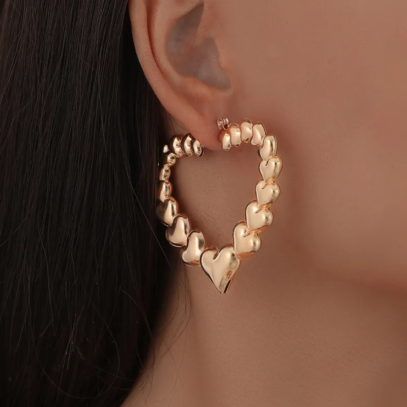 Exaggerated Multiple Heart Hollow Design Alloy Stud Earrings