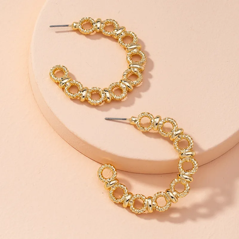 Exaggerated Twist Hollow Design Alloy Hoop Earrings