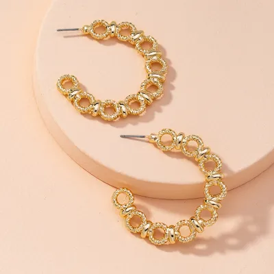 Exaggerated Twist Hollow Design Alloy Hoop Earrings